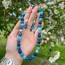 Heide Heinzendorff ronde zilveren aanhangers licht blauw E73