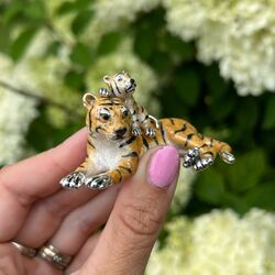 Saturno zilveren tijger met baby