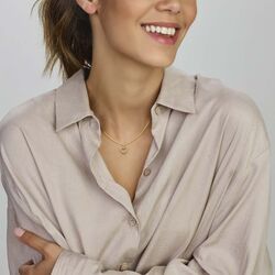 Gouden hanger met gevlochten hart