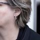 Zilveren smalle oorringen a-symetrische vorm