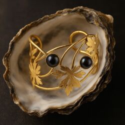 Verguld zilveren armband met bloem blaadjes van Bruno da Rocha