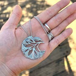 Zilveren collier ronde hanger bladeren Ginkgo van GL Timeless