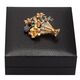 18 krt gouden bloemenmand broche 50er jaren smaragd robijn saffier