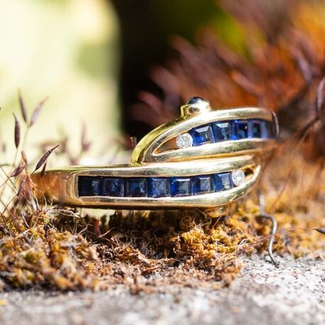 Vintage 14krt gouden slangenring met saffier en diamant