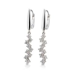 Witgouden oorbellen bezet met briljant  0.61ct H/Si