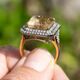 Gouden ring met rutielkwarts en 0.90 crt diamant indiagem