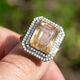 Gouden ring met rutielkwarts en 0.90 crt diamant indiagem