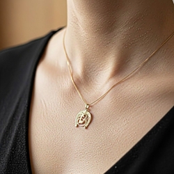 Vintage 18 krt gouden hoefijzer met nr 13