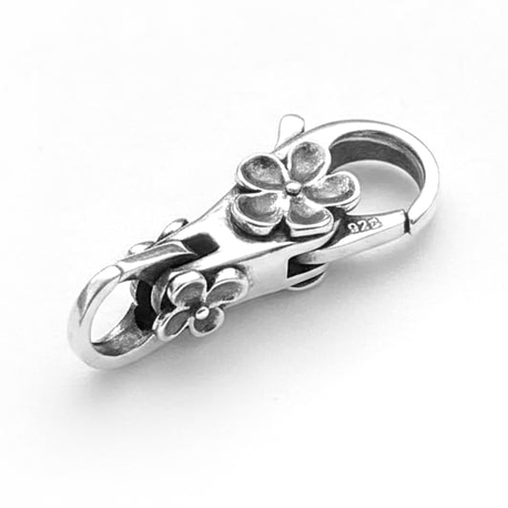 Zilveren connector met bloemen