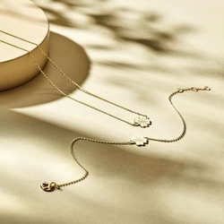 Geelgouden collier met gediamanteerde bolletjes