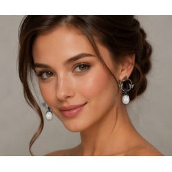 Zilveren oorstekers vlinders met zirkonia en een zoetwaterparel