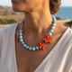 Uniek larimar collier met bloedkoraal en apetiet met rosé vergulde accenten en sluiting