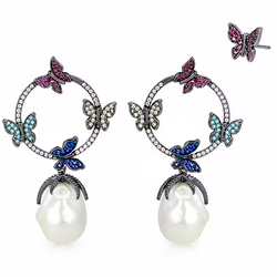 Zilveren oorstekers vlinders met zirkonia en een zoetwaterparel
