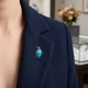 Zilveren pin broche pinquine turkoois markesiet granaat