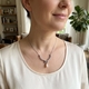 GL collier met hanger bloemen strik en crystalparel