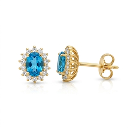 14krt gouden oorstekers London Blue topaas en diamant sale