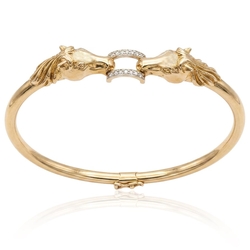 Vintage 18krt gouden armband paardhoofden met 14 diamanten