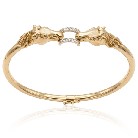 Vintage 18krt gouden armband paardhoofden met 14 diamanten