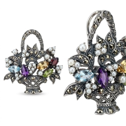 Bloemenmandbroche of hanger edelstenen