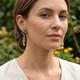Lange oorbellen strik met amethist, parels en strass