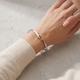 Zilveren slavenarmband bicolor