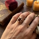Verguld zilveren ring met granaat en opaal