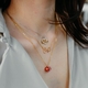 Julie Julsen verguld zilveren ketting granaat en roze saffier
