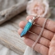 Zilveren hanger met titanium aura kristalkwarts