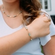 Julie Julsen vergulde armband Loving Stones turkooiskleurig jaspis en howliet