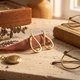 14krt bicolor gouden oorbellen met 0.10ct