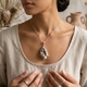 Starborn zilveren hanger gefossiliseerde schelp