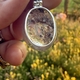 Achterzijde van de zilveren hanger met lodoliet tuintje of garden kwarts