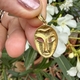 Vintage 18krt gouden hanger masker 3,4 gr