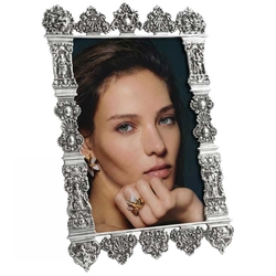 Vintage fotolijst met een zilveren bijbelslot rand