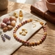 Heide Heinzendorff collier tigeroog, jade, jasper