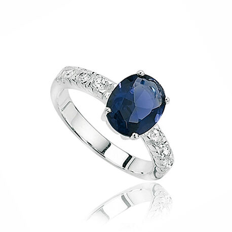 Zilveren ring met donkerblauw kristal en wit zirkonia