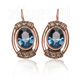 Vergulde oorbellen blauw strass