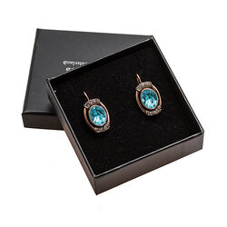roséverguld oorbellen blauw strass
