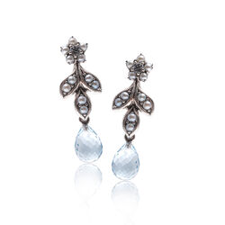 Zilver oorbellen met pareltjes en blauw topaas