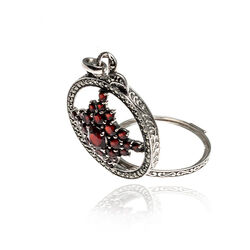 Zilveren hanger granaat met markasiet en loupe