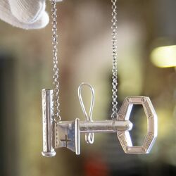 antieke zilveren breipenhouder sleutel