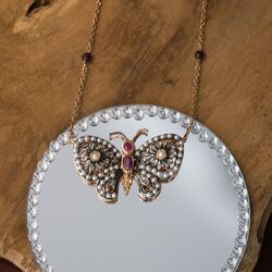 Roséverguld zilver collier vlinder met robijn parels strass