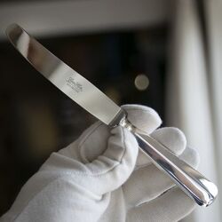 Dessertmes Hollands glad zilver heft gemaakt door de Gebroeders Huisman