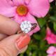 Witgouden ring met diamant baguette en briljant bloem