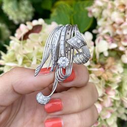 Witgouden broche met diamanten briljant en baguette