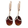 Tsars Collection rosé oorbellen bruine cat eye en guirlanders met zirkoon