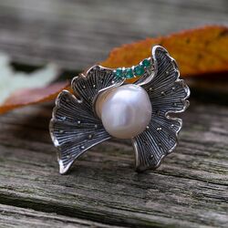 Grote zilveren ring smaragd en parel