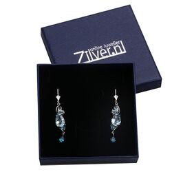 Lange zilveren oorbellen topaas