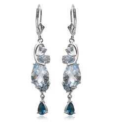 Lange zilveren oorbellen topaas