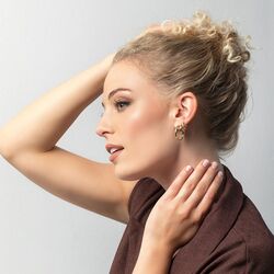 Bastian Inverun mat zilveren oorringen 18 mm